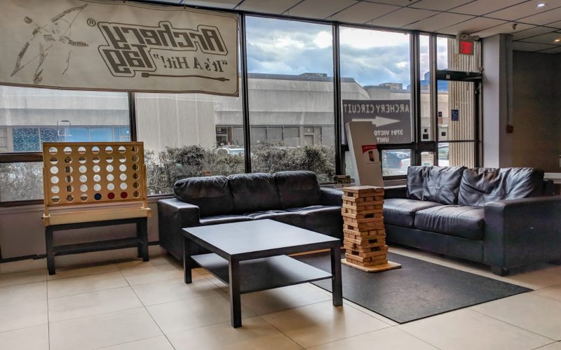 Lounge with couches and large mini-games for parents and guests to hang out